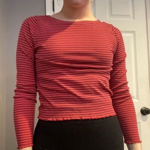 pink and black striped shirt